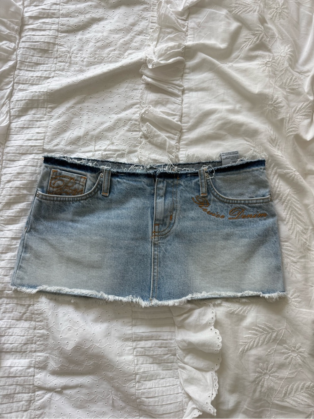REVICE Angel Denim Mini Skirt with Embroidered Detail